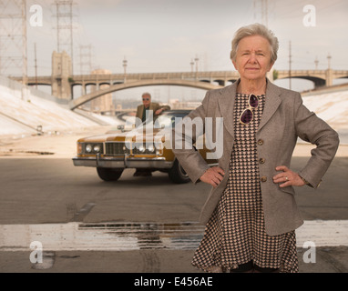Portrait of cool senior woman and husband with classic car, Los Angeles, California, USA Stock Photo