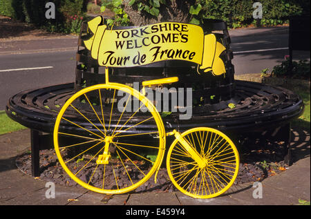 Yorkshire, UK. 2nd July, 2014. yellow penny farthing bicycle in the village of Scholes, Leeds welcoming the tour de france to Yorkshire United Kingdom Credit:  riddypix/Alamy Live News Stock Photo