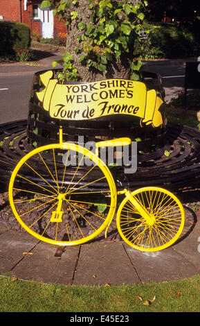 Yorkshire, UK. 2nd July, 2014. Yellow penny farthing bicycle in the village of Scholes, Leeds welcoming the tour de france to Yorkshire United Kingdom Credit:  riddypix/Alamy Live News Stock Photo