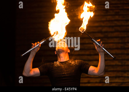 'Der Feuermann' shows his performance at 'Extraschicht' - the annual night of industrial culture in the western German Ruhr Area Stock Photo