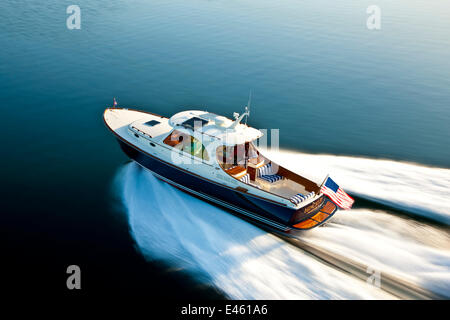 Hinckley T38 speedboat planing off Rhode Island, USA, August 2008. Model and property released. Stock Photo