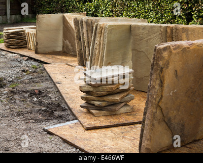 self building house, natural Indian stone slabs stacked in position ready for paving Stock Photo