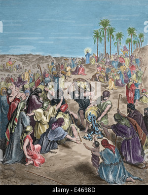 New Testament. Christ feeding the multitude (Matthew 14:17,18). Engraving by Gustave Dore, 1866. Later colouration. Stock Photo