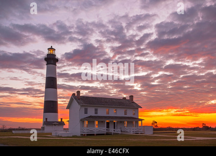 Cape Hatteras National Seashore, North Carolina: Sunrise at Bodie Island lighthouse (1872) on North Carolina's Outer Banks Stock Photo