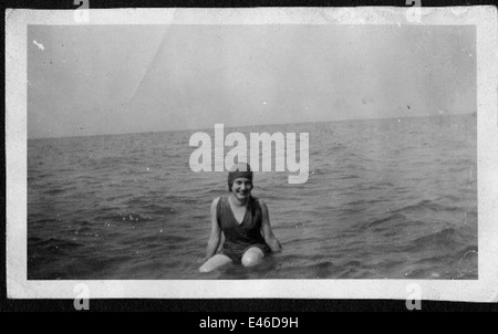 Helen Richey, a pioneering aviator, is seen outdoors in boots, jodhpurs ...