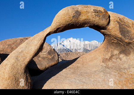 Mobius Arch, in California's Alabama Hills State Recreation Area forms a portal to view Lone Pine Peak. Stock Photo