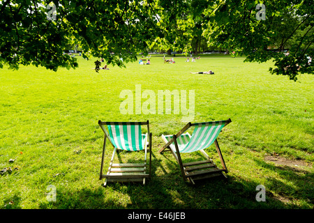 Deckchairs at London St. James's Park on a sunny day, England Stock Photo