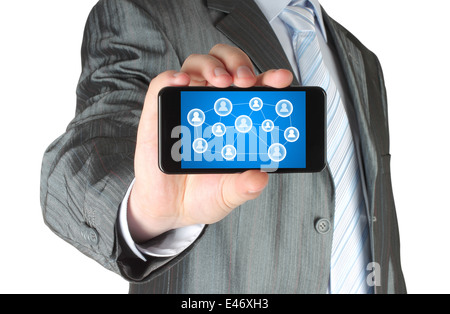 Businessman holds smart phone with social media concept close-up Stock Photo