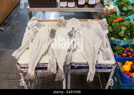 Salted fillets of dried white fish displayed for sale in the covered market at Chania, Crete Stock Photo