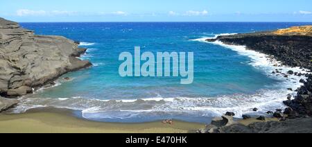 Visitors swim at the Mahana Beach near Naalehu (Hawaii). Stock Photo