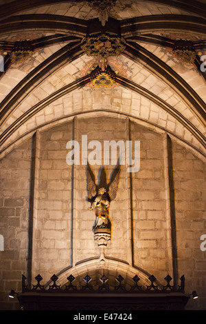 Angel statue and vaulted ceiling in the Barcelona Cathedral in Catalonia, Spain. Stock Photo