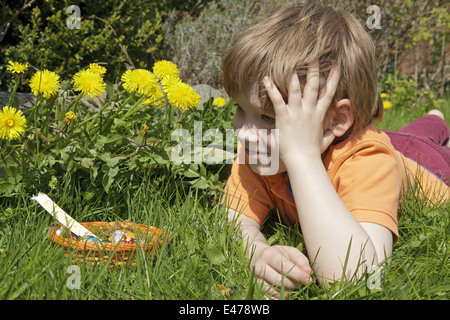 young boy has found Easter Eggs Stock Photo