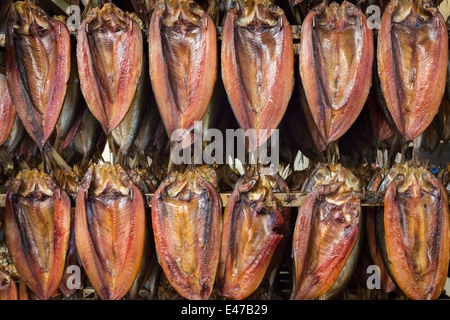 Kippers fresh out of smoker, Robson's smokehouse, Craster, Northumberland, May 2014 Stock Photo