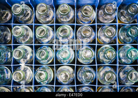 Empty soft drinks bottles in a crate Stock Photo
