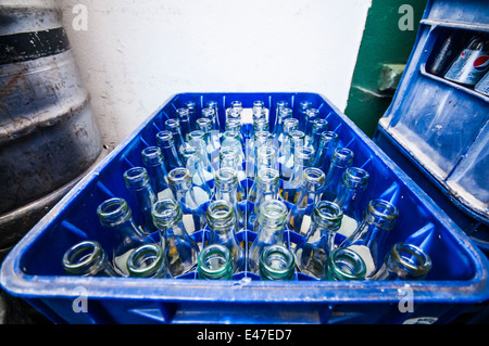 Empty soft drinks bottles in a crate Stock Photo