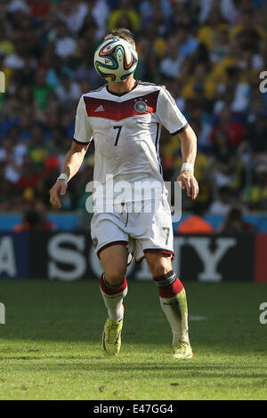 Germany's Bastian Schweinsteiger (R) vies for the ball with Argentina's ...