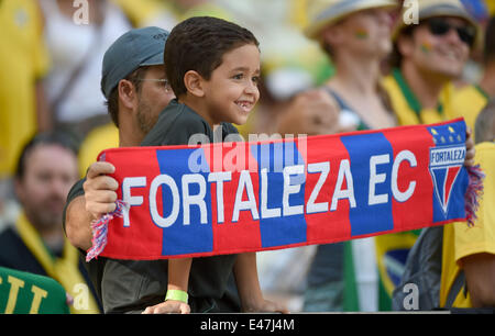 Fortaleza, Brazil. 4th July, 2014. Football fans wait for a quarter-finals match between Brazil and Colombia of 2014 FIFA World Cup at the Estadio Castelao Stadium in Fortaleza, Brazil, on July 4, 2014. Credit:  Li Ga/Xinhua/Alamy Live News Stock Photo