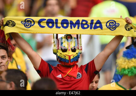 Fortaleza, Brazil. 04th July, 2014. Supporter of Colombia cheers prior to the FIFA World Cup 2014 quarter final match soccer between Brazil and Colombia in Fortaleza, Brazil, 04 July 2014. Photo: Marius Becker/dpa/Alamy Live News Stock Photo