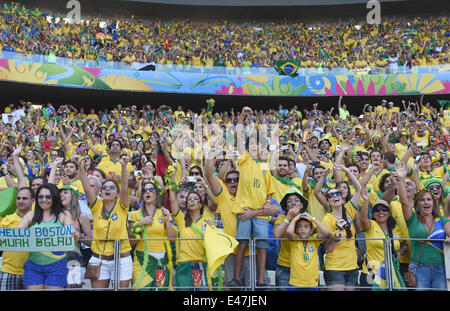 Fortaleza, Brazil. 4th July, 2014. Brazil's fans cheer before a quarter-finals match between Brazil and Colombia of 2014 FIFA World Cup at the Estadio Castelao Stadium in Fortaleza, Brazil, on July 4, 2014. Credit:  Li Ga/Xinhua/Alamy Live News Stock Photo