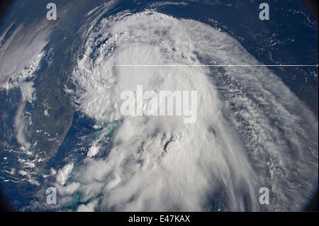 View of Hurricane Arthur as it moves along the Florida coast seen from the International Space Station July 2, 2014 in Earth Orbit. Arthur was churning in Atlantic waters off the coast of Florida and slowly moving northward. Stock Photo