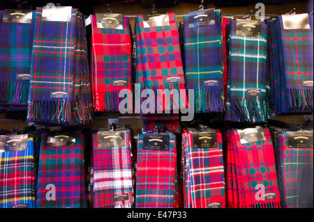 Traditional Scottish clan tartan scarves display for sale in James Pringle Weavers Shop in St Vincent Street in Glasgow SCOTLAND Stock Photo