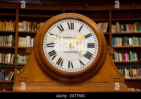 Clock in the Picton Reading Room, Central Library, Liverpool.  It sits over the door leading to the Hornby Library. Stock Photo
