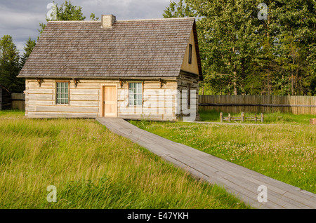 Old log cabin house building at Fort Saint St James National Historic Site trading post, British Columbia, Canada. Stock Photo