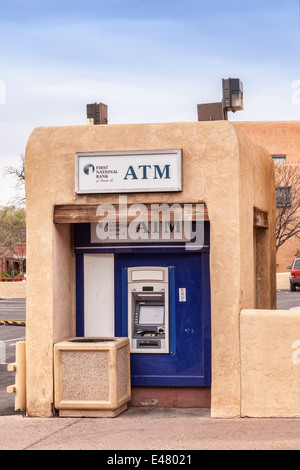 ATM in traditional style adobe housing in the historic district of Santa Fe, New Mexico. Stock Photo