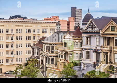 Beautiful old houses in Alamo Square, San Francisco, known as the Painted Ladies. They are an icon of the city. Stock Photo