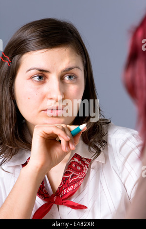 A lovely casual businesswoman having an enjoyable discussion with another person. Stock Photo