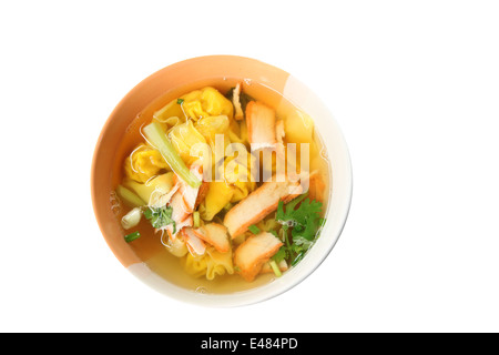 Wonton noodles soup in bowl of isolated on white background. Stock Photo