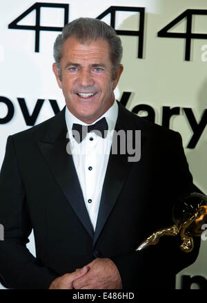 Actor Mel Gibson accepts the Crystal Globe for Outstanding Artistic Contribution to World Cinema during the opening of the 49th Karlovy Vary International Film Festival at Hotel Thermal in Karlovy Vary, Czech Republic, on 04 July 2014. Photo: Hubert Boesl - NO WIRE SERVICE Stock Photo