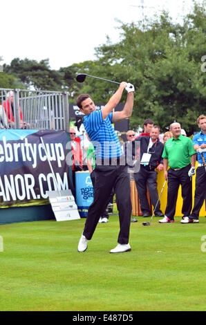 Newport, Wales. July 5th 2014. Gethin Jones tees off at The Celebrity Cup at Celtic Manor resort in Wales. Robert Timoney/AlamyLiveNews Stock Photo
