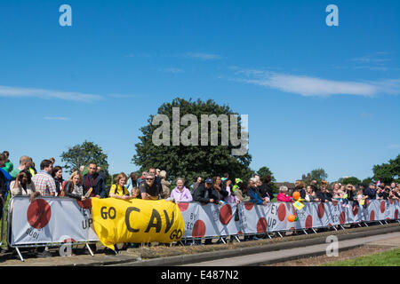 Scott Hall Playing Fields, Potternewton, Leeds, Yorkshire, UK. July 5th 2014. People gather to cheer on the riders of the Tour De France, which is starting in Leeds today. Credit: Patricia Phillips/Alamy Live News Stock Photo