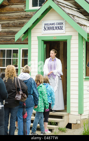 School teacher at schoolhouse reenactment in historic old gold town Barkerville, British Columbia, Canada. Stock Photo