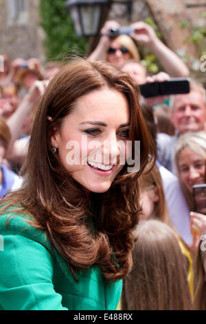Catherine, Duchess of Cambridge GCVO, a member of the British royal family Kate, on a royal walkabout with visit to the village of West Tanfield prior to the arrival of the of the Tour de France peloton. The village has especially embraced the “Le Grand Depart.  The Tour de France is the largest annual sporting event in the world. It is the first time Le Tour has visited the north of England having previously only made visits to the south coast and the capital. Stock Photo