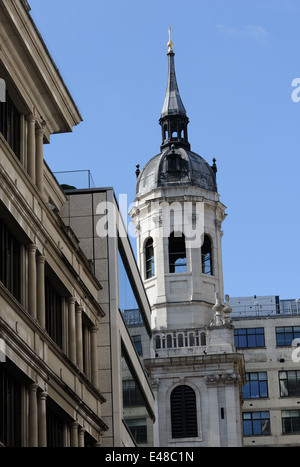 The tower of the church of St Magnus the Martyr against modern office buildings. Lower Thames Street, City of London, UK. Stock Photo