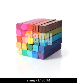 The cube from multicolored artist's pastels isolated on white background Stock Photo
