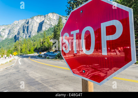 Stop sign next to the Tunnel View parking lot. Yosemite National Park, California, United States. Stock Photo