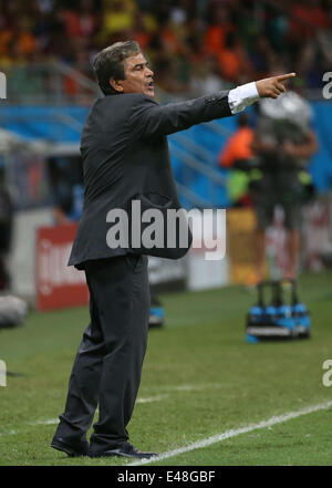 Salvador, Brazil. 5th July, 2014. Costa Rica's coach Jorge Luis Pinto gives instructions during a quarter-finals match between Netherlands and Costa Rica of 2014 FIFA World Cup at the Arena Fonte Nova Stadium in Salvador, Brazil, on July 5, 2014. Credit:  Cao Can/Xinhua/Alamy Live News Stock Photo