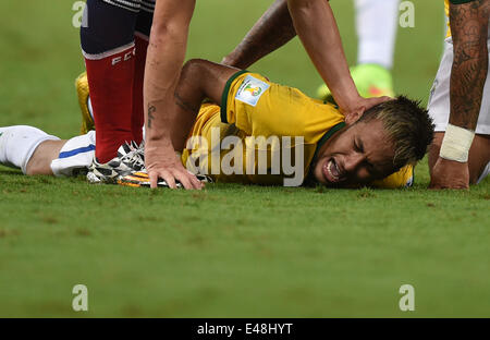 Fortaleza, Brazil. 04th July, 2014. Neymar of Brazil lies on the pitch after picking up an injury during the FIFA World Cup 2014 quarter final match soccer between Brazil and Colombia at the Estadio Castelao in Fortaleza, Brazil, 04 July 2014. Credit:  Action Plus Sports/Alamy Live News Stock Photo