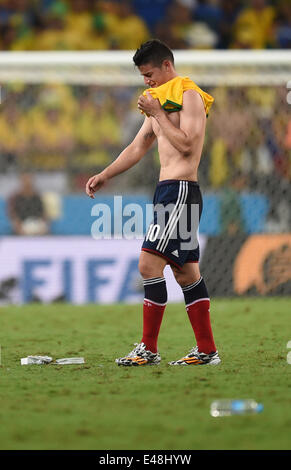 Fortaleza, Brazil. 04th July, 2014. James Rodriguez of Colombia leaves the pitch in tears after the FIFA World Cup 2014 quarter final match soccer between Brazil and Colombia at the Estadio Castelao in Fortaleza, Brazil, 04 July 2014. Credit:  Action Plus Sports/Alamy Live News Stock Photo