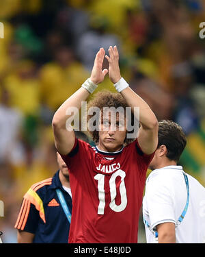 Fortaleza, Brazil. 04th July, 2014. David Luiz of Brazil wearing the shirt of James Rodriguez of Colombia celebrates after the FIFA World Cup 2014 quarter final match soccer between Brazil and Colombia at the Estadio Castelao in Fortaleza, Brazil, 04 July 2014. Credit:  Action Plus Sports/Alamy Live News Stock Photo