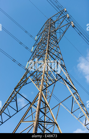 Looking up towards the top of an electricity pylon in Yorkshire, England Stock Photo