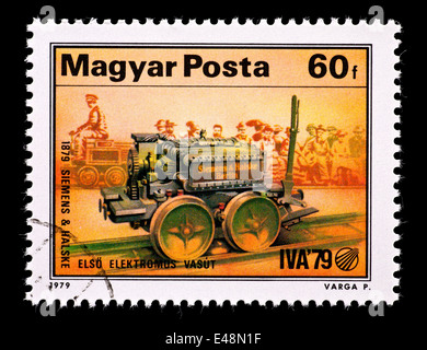 Postage stamp from Hungary depicting a Siemens first electric locomotive (1879). Stock Photo