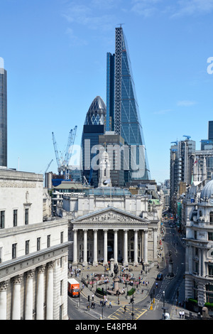 Bank road junction in city of London with Leadenhall landmark Cheese Grater office block towering over Royal Exchange& Gherkin London England UK Stock Photo