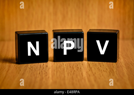 NPV or net present value text on black block Stock Photo