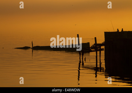 Fishermen on the Rio de la Plata in Buenos Aires Stock Photo