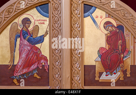 Bruges - The Annunciation scene on the door to presbytery in st. Constanstine and Helena orthodox church Stock Photo