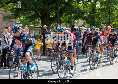 Team Sky in the main peleton on the second stage of the Tour de France passess through Harrogate, Yorkshire, England Stock Photo